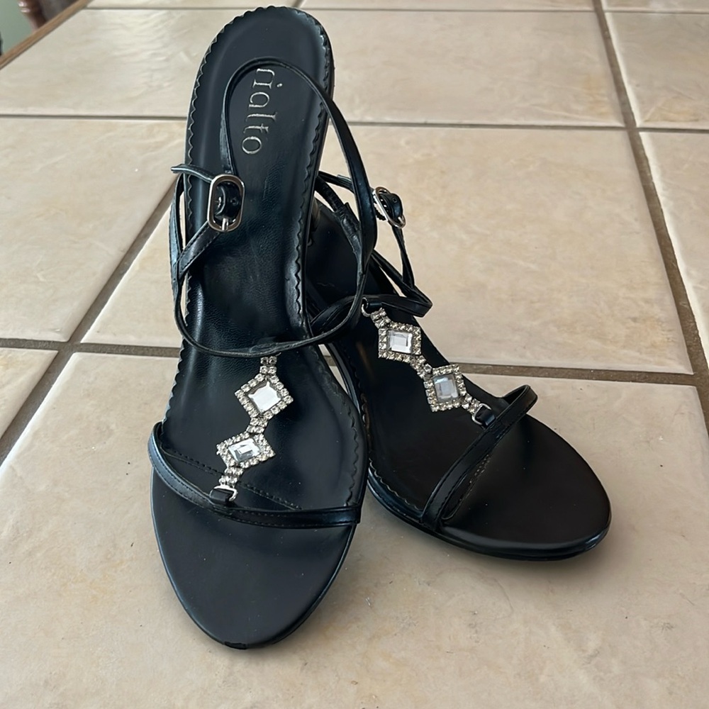 Strapped black dress heels.